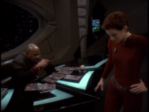 Even a StarFleet Captain like Benjamin Sisko can find this sort of thing daunting, and needs to seek Kira's help in straightening this out!